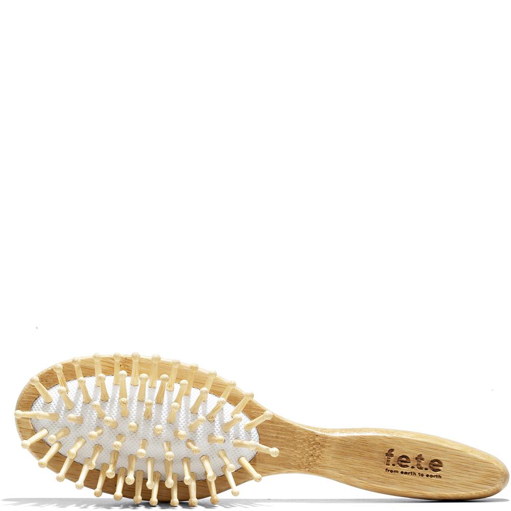 http://www.petitvour.com/cdn/shop/products/f-e-t-e-hairbrush-small-bamboo-brush-16496581640254.jpg?v=1670049560